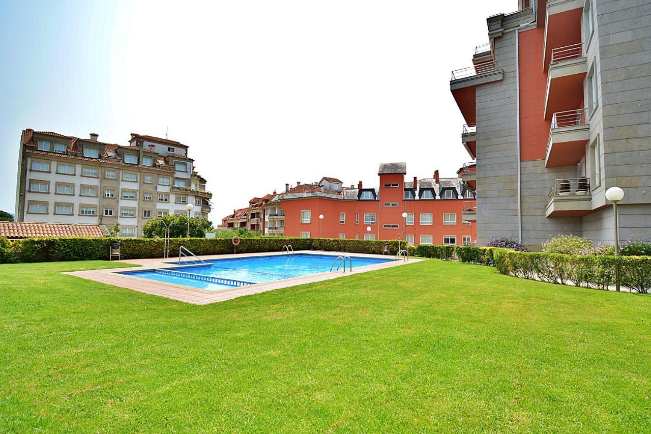 Galihost - Apartamento Con Piscina En El Centro De Sanxenxo Dış mekan fotoğraf
